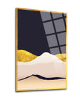 Modern glass artwork featuring abstract mountain landscape with gold accents and reflective design.