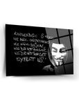 Artistic print featuring a masked figure with the text 'Knowledge is free. Expect us.' on a black background.