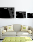 Alevli Anka Cam Tablo sizes displayed on a wall above a modern sofa, showcasing 100cm, 70cm, 65cm, and 30cm options.