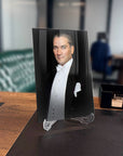 Atatürk 145 Cam Tablo on a desk, showcasing a high-quality UV printed glass design with a stylish holder.