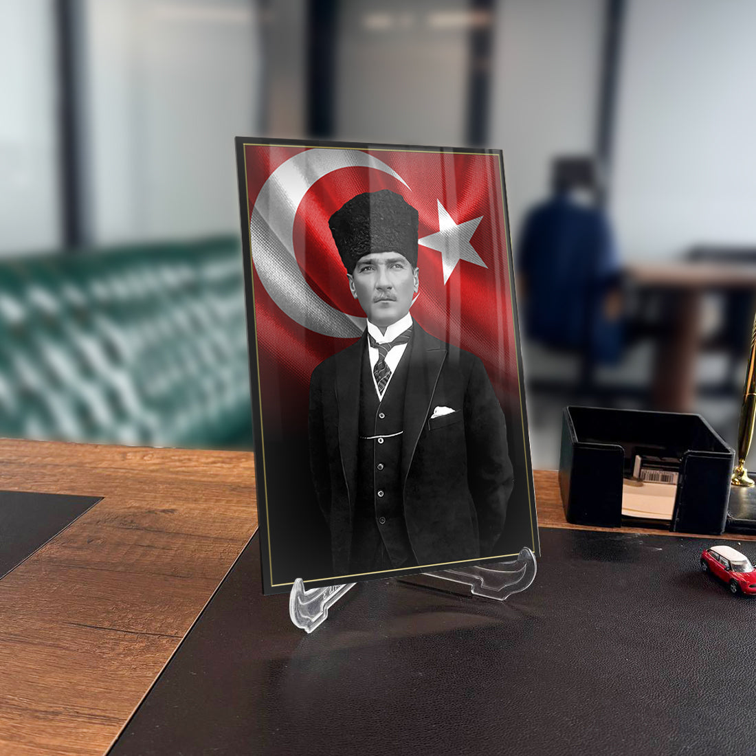 Atatürk glass plaque displaying Turkish flag, high-quality tempered glass with UV printing, modern office decor.