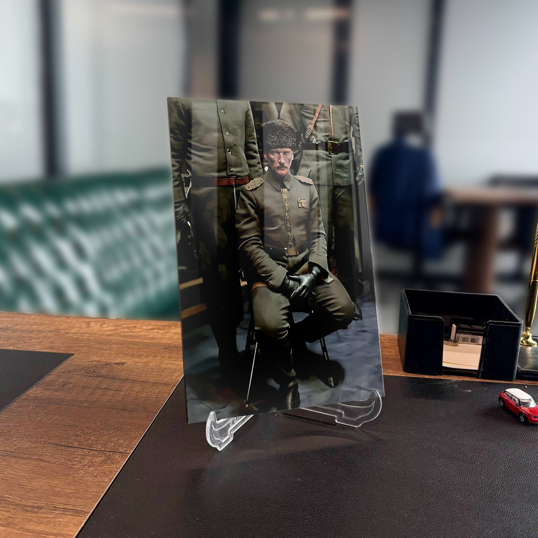 Atatürk 169 Cam Tablo on display in an office, showcasing a historical figure in military attire.