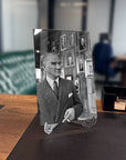 Atatürk 122 Cam Tablo displayed on a desk with vintage setting and background portraits.