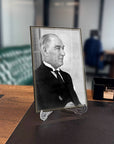 Atatürk 177 Cam Tablo displayed on an office desk, showcasing elegant design and high-quality tempered glass.