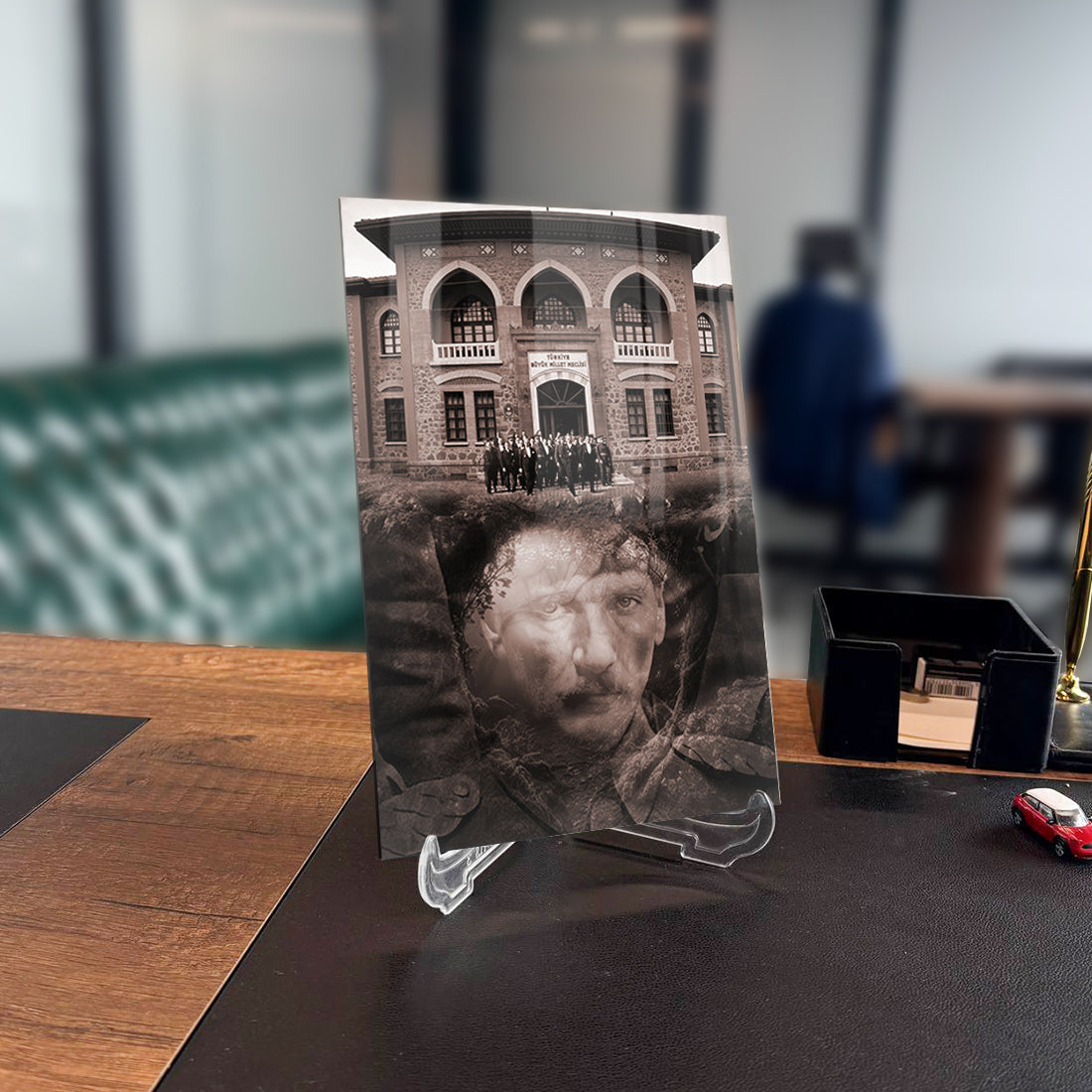 Atatürk 163 Cam Tablo on a desk, showcasing high-quality tempered glass with UV printing.