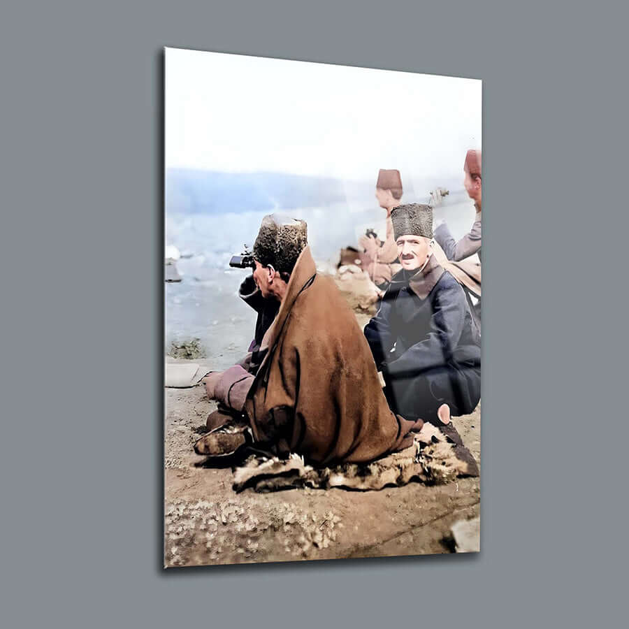 Vintage photo of two men wearing traditional hats, sitting by a body of water, in a scenic natural setting.